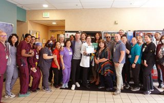 Group celebrating daisy winner